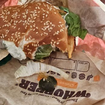 Burger King - Pickle with shredded end and onion skin from outside of onion. Very hard on the teeth. - Hot Dogs Near Me - Medicine Hat, Alberta Burger King - Pickle with shredded end and onion skin from outside of onion. Very hard on the teeth. - Hot Dogs Near Me - Medicine Hat, Alberta