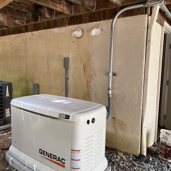 Bucy Electric LLC - a generator in a garage - Electricians Near Me - Sevierville, Tennessee Bucy Electric LLC - a generator in a garage - Electricians Near Me - Sevierville, Tennessee