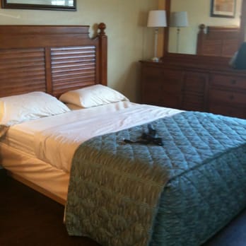 Seashell Village Resort - Bed and vanity - Resorts Near Me - Port Aransas, Texas