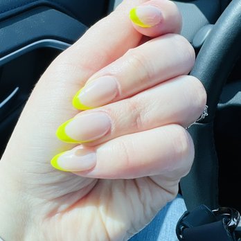 Luminous Nail Studio - A light lime green neon (the light makes it look more yellow) classic french set done by lorin. Perfect for spring/summer! Love them! - Nail Technicians Near Me - Lancaster, California