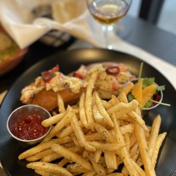 Taco Rico Hollywood - a plate of french fries and a hot dog - Colombian Near Me - Hollywood, Florida