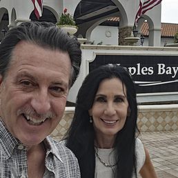 ROSARIO S. CASSATA AND CAROLYN AT THE NAPLES BAY CLUB AND MARINA IN NAPLES, FLORIDA.