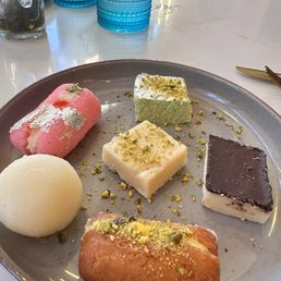 Variety of desserts, chosen by our waiter. he was very kind to make selections for us.
