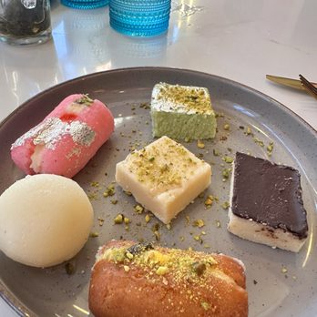 Monica’s Mithai Cafe & Bar - Variety of desserts, chosen by our waiter. he was very kind to make selections for us. - Indian Near Me - Andover, Massachusetts
