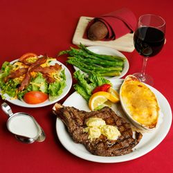 St James Restaurant & Cabaret - Feast on our Monterey Ribeye available on our Members Only VIP menu. A 20 oz. bone in ribeye perfectly seasoned and char-grilled to order.