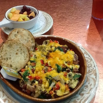 Another Broken Egg Cafe - The supreme omelette with double red peppers and spinach added.  Oh, and fruit instead of potatoes. - Breakfast & Brunch Near Me - Houston, Texas