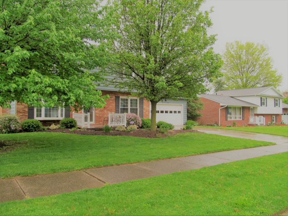 NATALIE YOUNG HOWARD HANNA REAL ESTATE SERVICES 4758 Dressler Rd