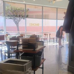 Front seating of shop with their little stand to pick up your order.
