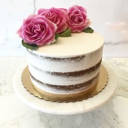 Clean Sweets By Sasha - Chocolate cake with semi-naked coconut frosting and pink roses