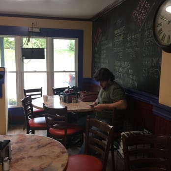 Goldberg's Pizza and Bagels - My husband waiting patiently for me to finish this review - Pizza Near Me - Bridgehampton, New York Goldberg's Pizza and Bagels - My husband waiting patiently for me to finish this review - Pizza Near Me - Bridgehampton, New York