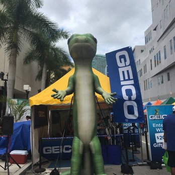 Miami Book Fair International - Ahhhhh oh no it's Godzilla and he is screaming about saving money on car insurance?! Oh wait no it's Geico - Festivals Near Me - Miami, Florida