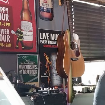 The Next Stop - Guitar stands on the wall - Bars Near Me - Houlton, Wisconsin The Next Stop - Guitar stands on the wall - Bars Near Me - Houlton, Wisconsin