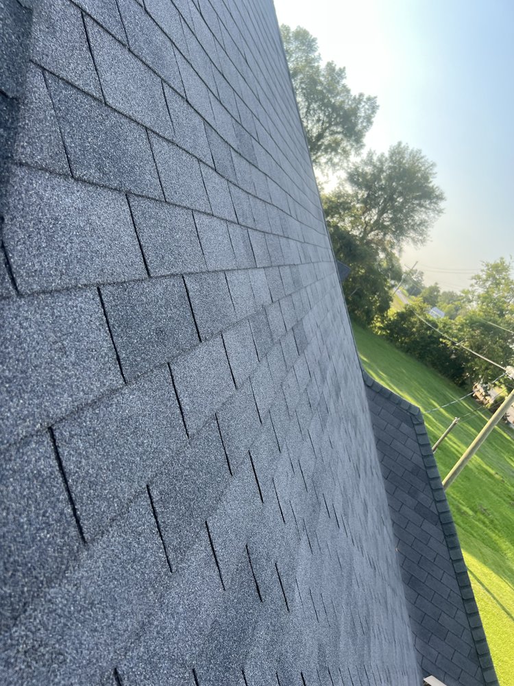 Slide of All In One Exterior & Construction