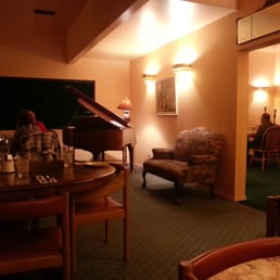 a piano in the middle of the room a piano in the middle of the room