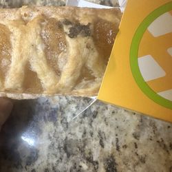 McDonald's - I WISH I KNEW WTF THIS WAS ON THE PIE THAT I ORDERED! It looks hairy. DISGUSTED TO SAY THE LEAST!!