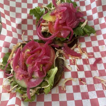 Yuca Mami - Panuchos plate. It's 3 tacos but I ate one already, I do wish there was more chicken on it though. - Food Trucks Near Me - Santa Rosa, California