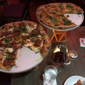 Weights + Measures - Carrot pizza and pepperoni pizza - Bars Near Me - Houston, Texas