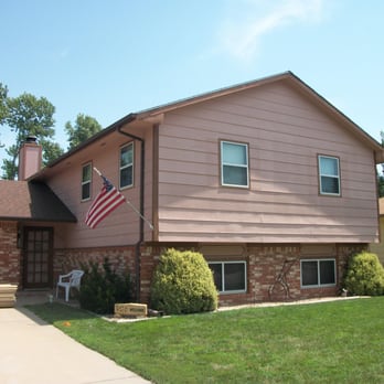 Keeler Construction - 30 year old Masonite siding before replaced - General Contractors Near Me - Wichita, Kansas
