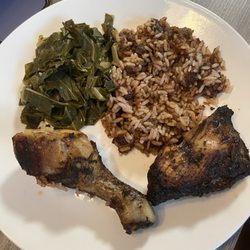 Coastline Caribbean Restaurant - We get take out - this is just 1/2 of a meal - jerk chicken, peas and rice, and collard greens. Enough for us for a 2nd meal tomorrow.