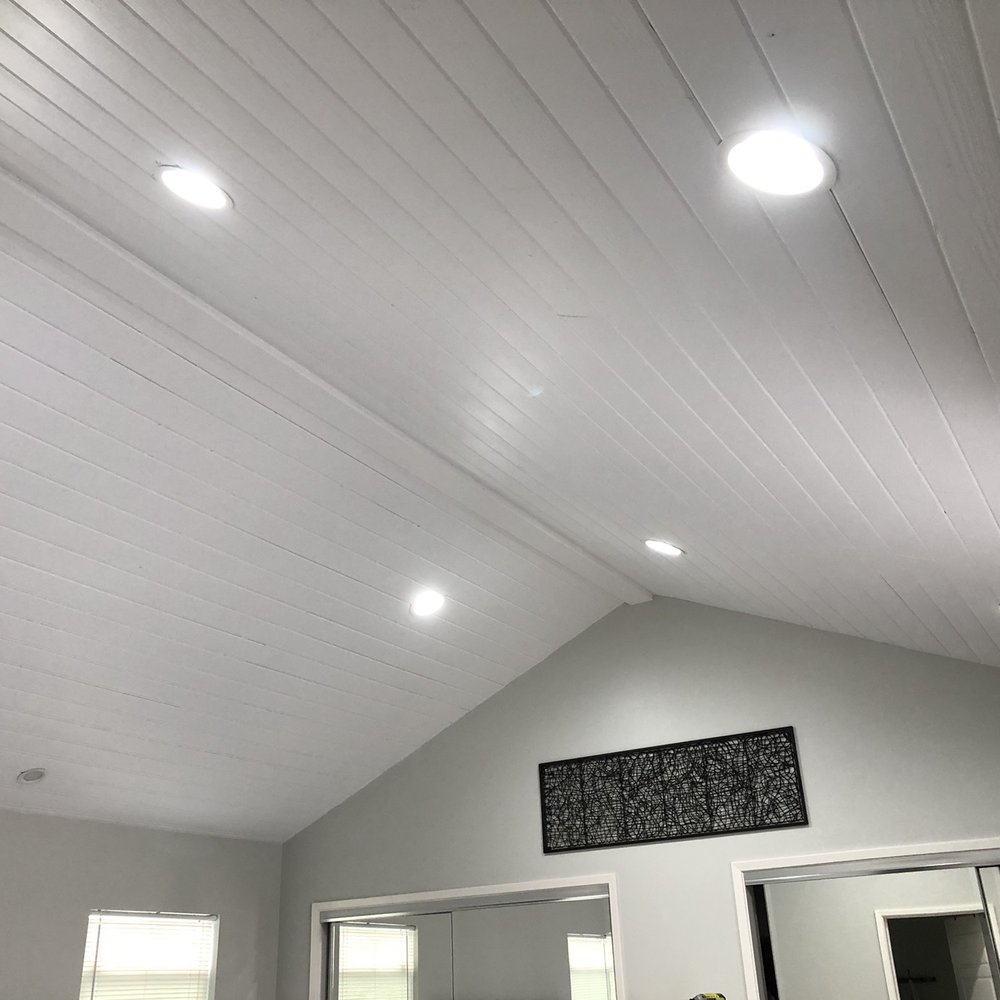 New tongue and groove wood ceiling and painted walls