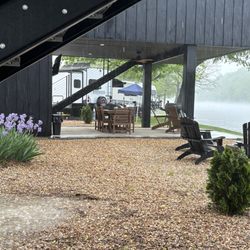 Blue Heron Campground & Resort on the White River - Looking up river while grilling in the evening rain shower