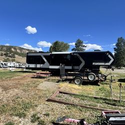 Pagosa Springs RV Park - Our new Brinkley 2027 G4170 and a beautiful skyline!
