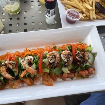 The Fred - Brunch menu- well seasoned and grilled shrimp on a bed of lettuce. - Resorts Near Me - Frederiksted, Virgin Islands