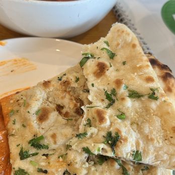 Sangam Indian Cuisine - Garlic Naan (almost finished eating) - Indian Near Me - Cockeysville, Maryland