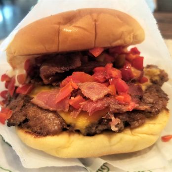 Shake Shack Livingston at the Circle - Smoke Shack - Single or Double Cheeseburger topped with Niman Ranch applewood smoked bacon, chopped cherry peppers, ShackSauce™. - Fast Food Near Me - Livingston, New Jersey Shake Shack Livingston at the Circle - Smoke Shack - Single or Double Cheeseburger topped with Niman Ranch applewood smoked bacon, chopped cherry peppers, ShackSauce™. - Fast Food Near Me - Livingston, New Jersey
