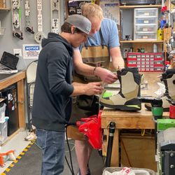Hillcrest Ski & Sports - Service guys doing boot surgery