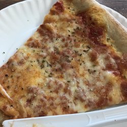 Pina's Pizza lll - Basic cheese slice.