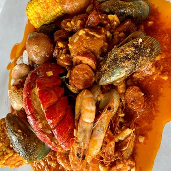 The Boiling Crab - Combo with 1 lobster tail. Whole Shabang sauce with extra garlic and extra butter. Sauce is excellent. - Seafood Near Me - Honolulu, Hawaii The Boiling Crab - Combo with 1 lobster tail. Whole Shabang sauce with extra garlic and extra butter. Sauce is excellent. - Seafood Near Me - Honolulu, Hawaii