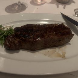 Aged New York Strip medium rare .