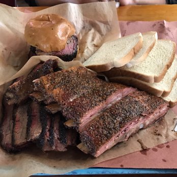 Franklin Barbecue - 1 pound fatty brisket and pork ribs, brisket sandwich in the back - Barbeque Near Me - Austin, Texas Franklin Barbecue - 1 pound fatty brisket and pork ribs, brisket sandwich in the back - Barbeque Near Me - Austin, Texas