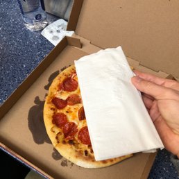 Napkin pizza with extra oil, insult to pizza