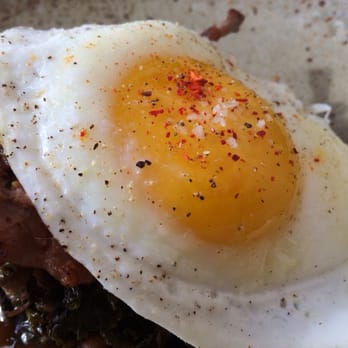 Husk - Manchester quail, Husk boudin, braised greens, fried farm egg - Southern Near Me - Nashville, Tennessee