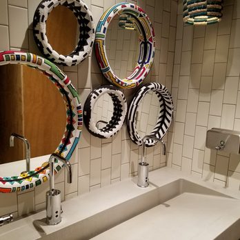 Nando's Peri-Peri - Beautiful mirrors in women's rest room - South African Near Me - Chicago, Illinois