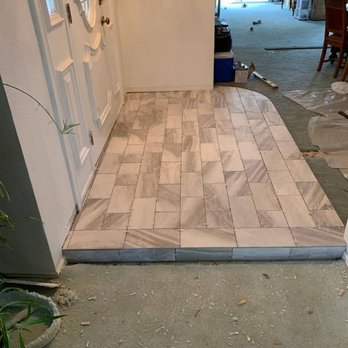 Suncrest Home Builders - a tile floor being installed - General Contractors Near Me Suncrest Home Builders - a tile floor being installed - General Contractors Near Me