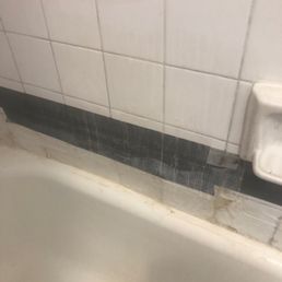 Bathroom titles held with duck tape. Bathroom titles held with duck tape.