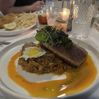 Stone Creek - Ahi tuna with duck confit and vegetable rice with a quail egg on top - American Near Me - Marcellus, New York