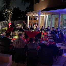 a large group of people eating outside