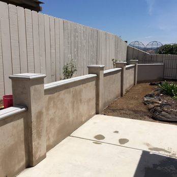 Construction Genetics - a concrete retaining wall and concrete planters - General Contractors Near Me Construction Genetics - a concrete retaining wall and concrete planters - General Contractors Near Me