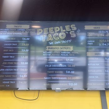 Peeples Taco’s - Menu - Digital menu board at Peeples Taco’s listing tacos, burgers, sides, and drinks with prices, including options like cheese fries and bottled water. - Fast Food Near Me - Hazel Crest, Illinois
