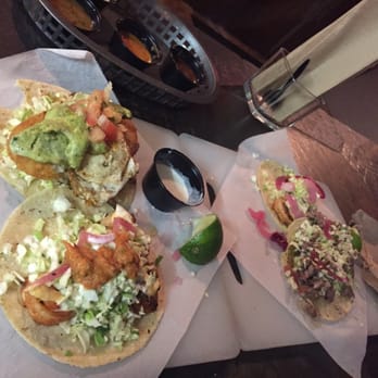 BOCA by Chef Maria Mazon - AM Taco (hashbrown with fried egg on top), grilled camarones on one plate. Macho Taco and more grilled camarones on other plate. - Mexican Near Me - Tucson, Arizona