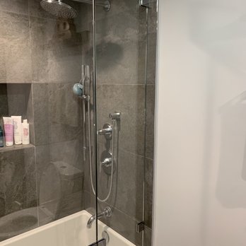 Schicker Luxury Shower Doors, Inc. - Fixed panel + glass door. - Glass & Mirrors Near Me - Concord, California Schicker Luxury Shower Doors, Inc. - Fixed panel + glass door. - Glass & Mirrors Near Me - Concord, California
