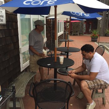 Ceriello Fine Foods - a man sitting at a table - Delis Near Me - Wainscott, New York Ceriello Fine Foods - a man sitting at a table - Delis Near Me - Wainscott, New York