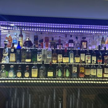 Sabor Latino Guatemala Restaurant - a bar filled with liquor bottles - Latin American Near Me - Netcong, New Jersey Sabor Latino Guatemala Restaurant - a bar filled with liquor bottles - Latin American Near Me - Netcong, New Jersey