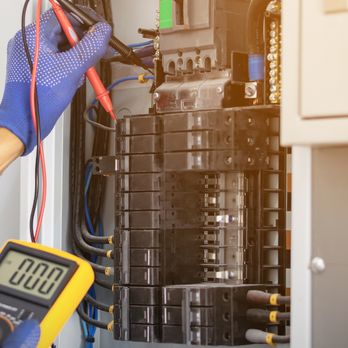 Simply Electric - Electrician working on a panel. - Electricians Near Me Simply Electric - Electrician working on a panel. - Electricians Near Me