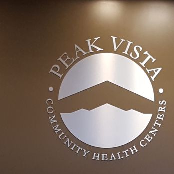 Peak Vista - The branded lobby sign of the Health Center at Printers Parkway, 340. - Family Practice Near Me - Colorado Springs, Colorado Peak Vista - The branded lobby sign of the Health Center at Printers Parkway, 340. - Family Practice Near Me - Colorado Springs, Colorado