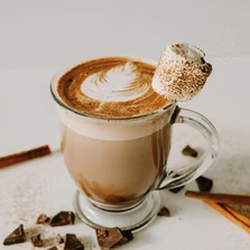 Acacia Collective - Campfire Mocha Rich espresso, chocolate, a hint of warm chai flavor, toasted marshmallow, and topped with a sprinkle of cinnamon.